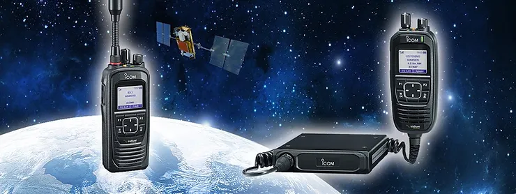 Two satellite communication devices floating in space with Earth and a satellite in the background, highlighting global satellite communication technology.